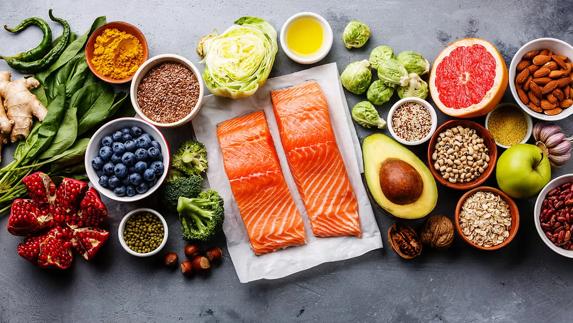 A selection of healthy whole foods laid out on a table