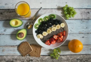 A plate of fresh sliced fruit